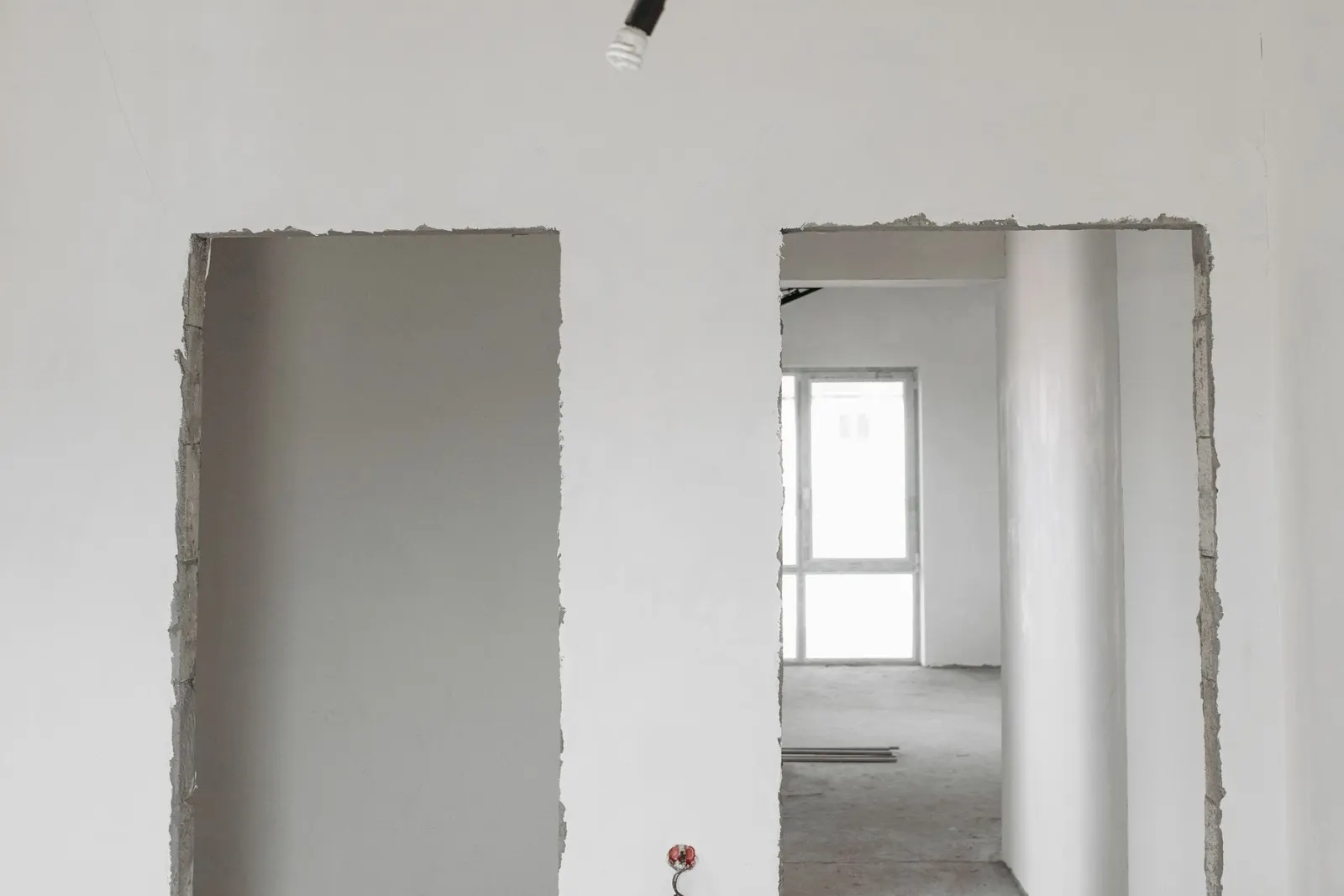A room under construction with boarded walls