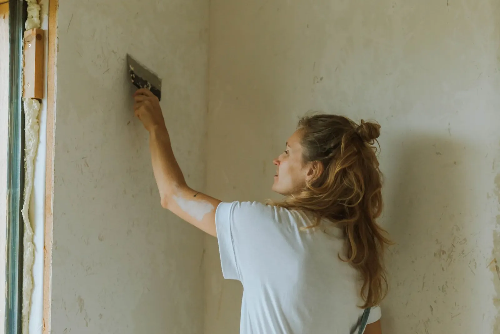 Polishing a wall to a smooth sheen